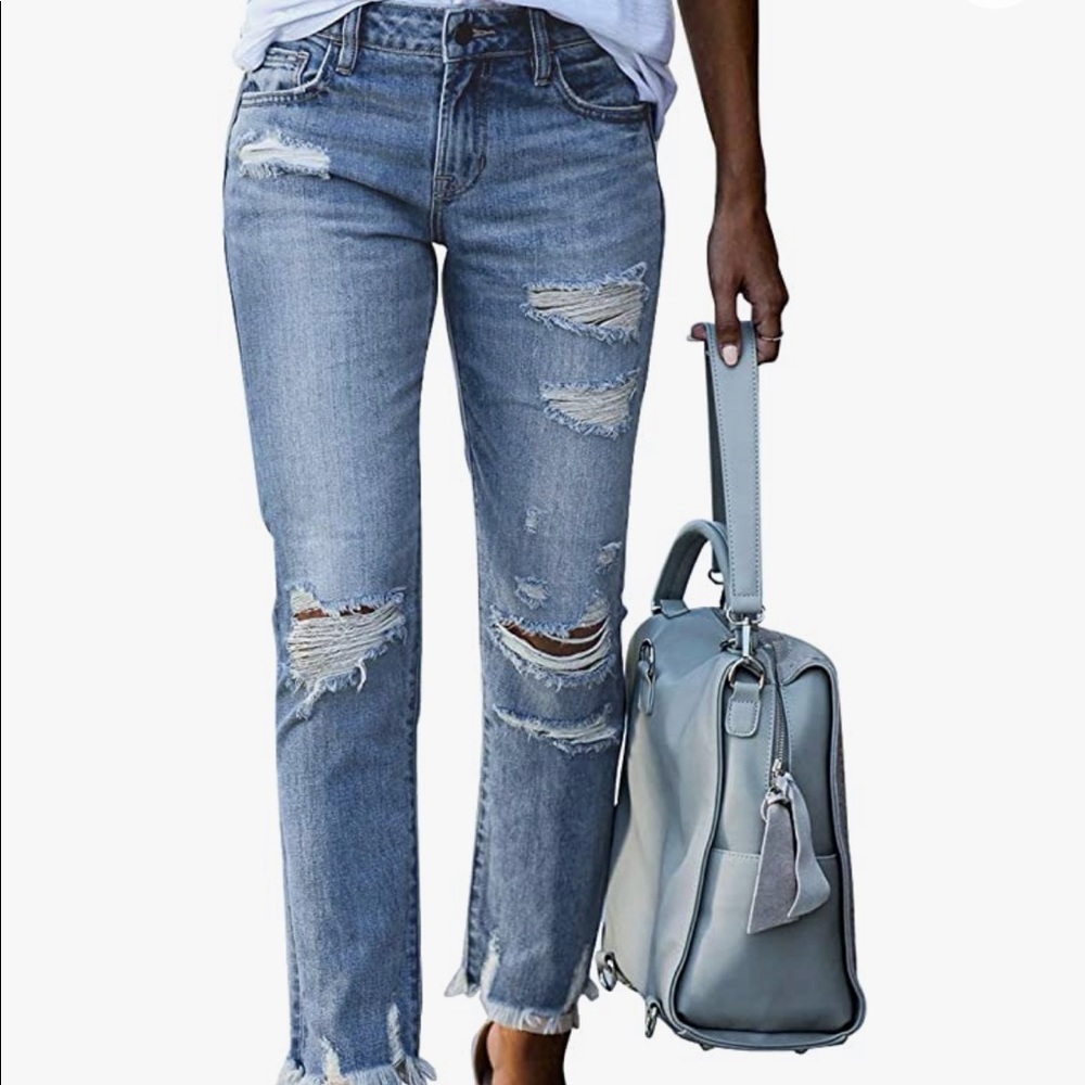 Never worn distressed Jeans